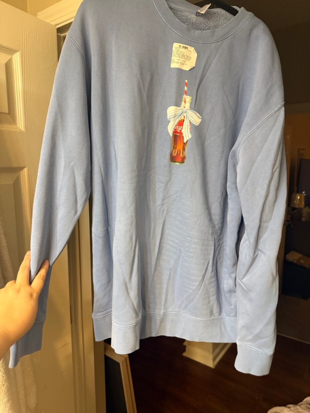 Light Blue Crewneck Sweatshirt with Soda Bottle Motif